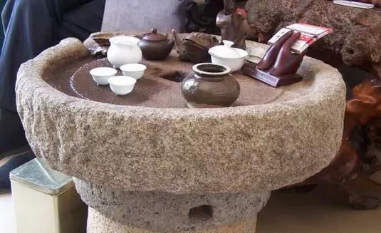 石磨茶具改造：变废为宝的创业新思路，月入5万不是梦！